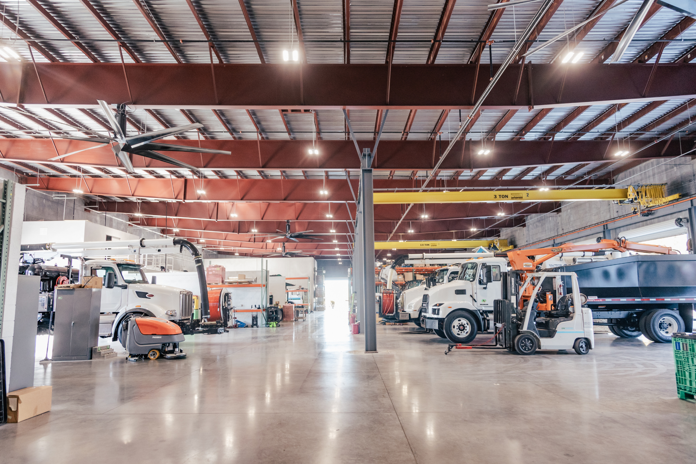 EPG service shop interior with equipment and trucks